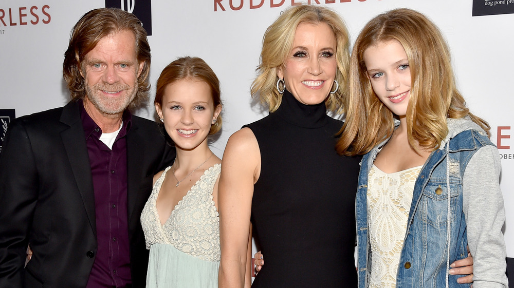 Felicity Huffman, William H. Macy, Sophia Macy, and Georgia Macy posing on the red carpet