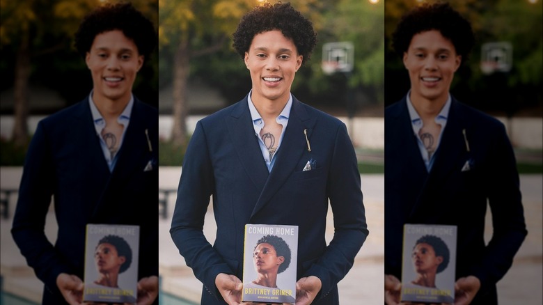 Brittney Griner holding her memoir