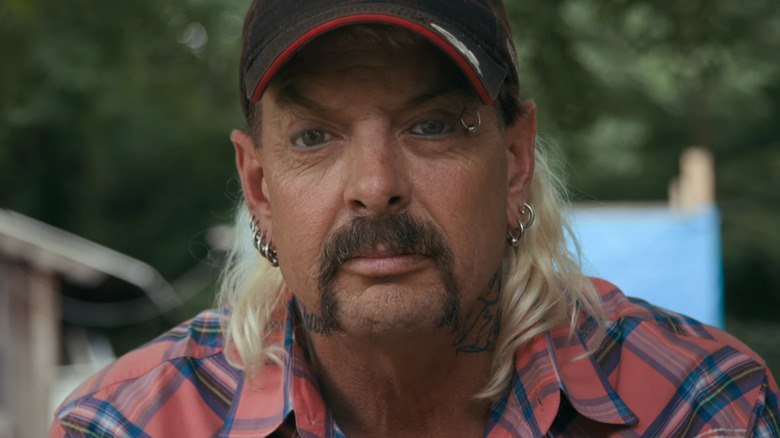 Joe Exotic looking at a camera