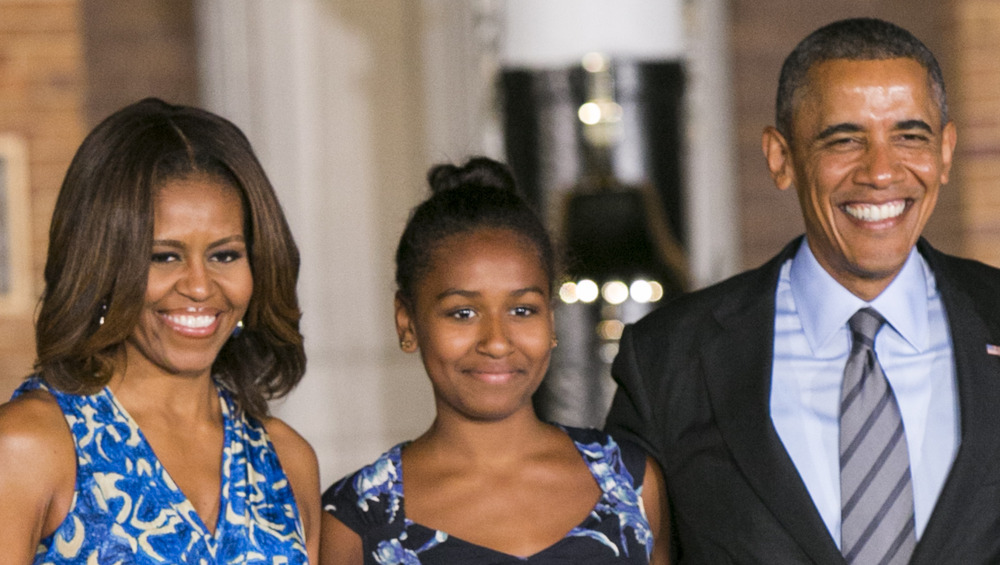 Michelle Obama, Sasha Obama, and Barack Obama together