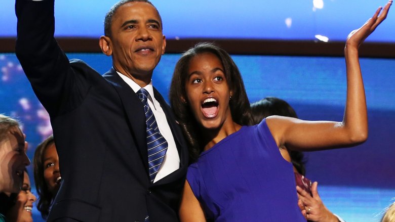 Malia Obama and Barack Obama