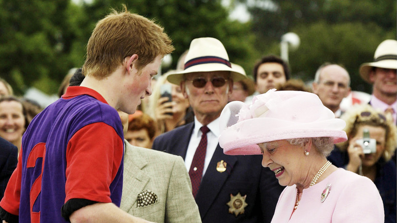 young Prince Harry speaking to Queen Elizabeth II