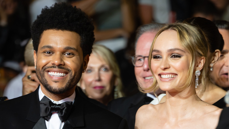 The Weeknd and Lily-Rose Depp smiling