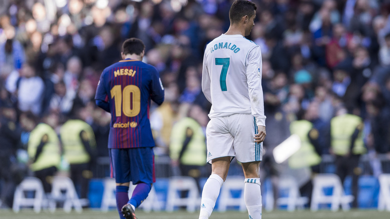 Cristiano Ronaldo and Lionel Messi on the field in 2017