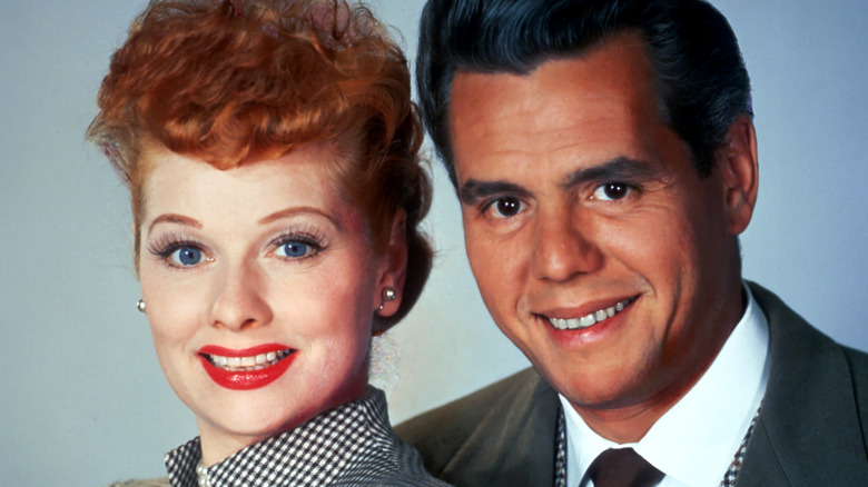 Lucille Ball and Desi Arnaz smile together