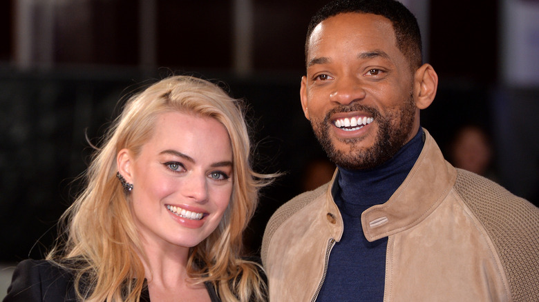 Will Smith posing with Margot Robbie