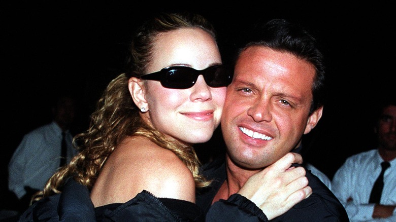 Luis Miguel and Mariah Carey embrace