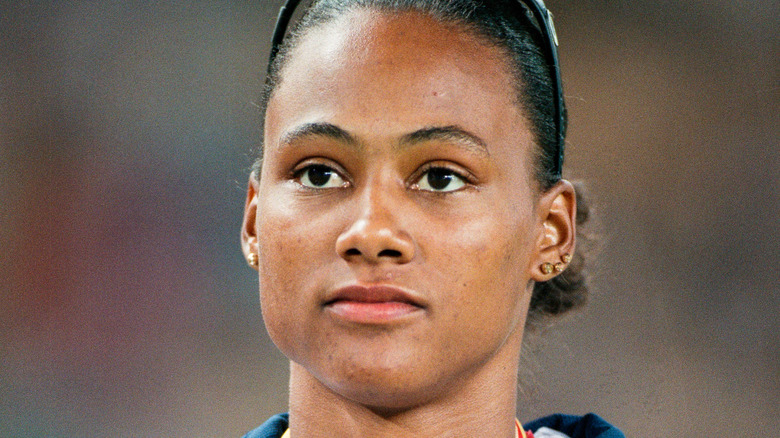 Marion Jones at a medal ceremony after scoring a major win 