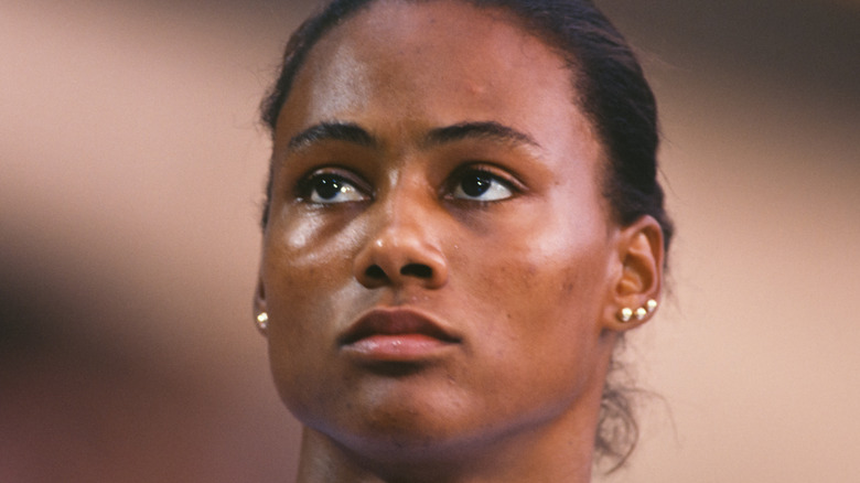 Marion Jones looking up after a race 