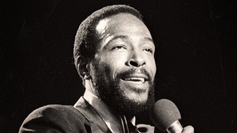 Marvin Gaye holding a microphone