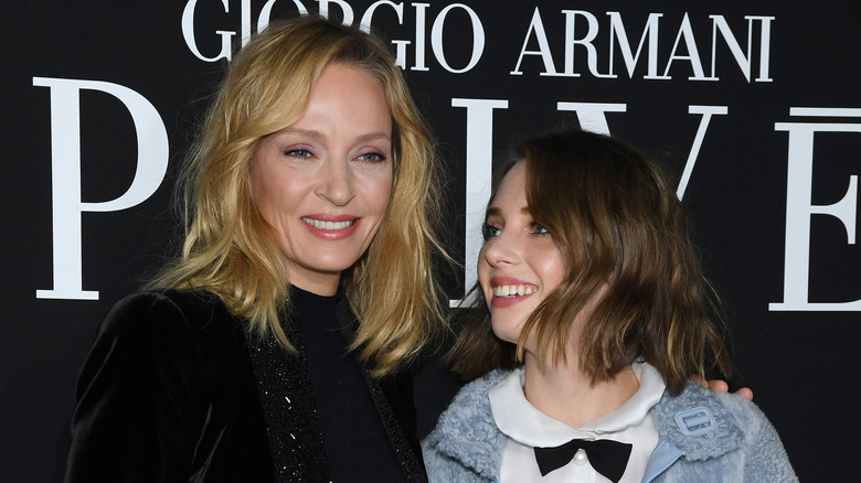 Maya Hawke smiling with Uma Thurman