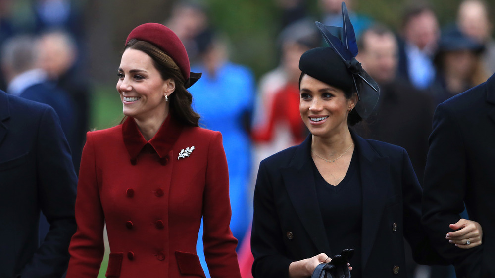 Kate Middleton and Meghan Markle walking together