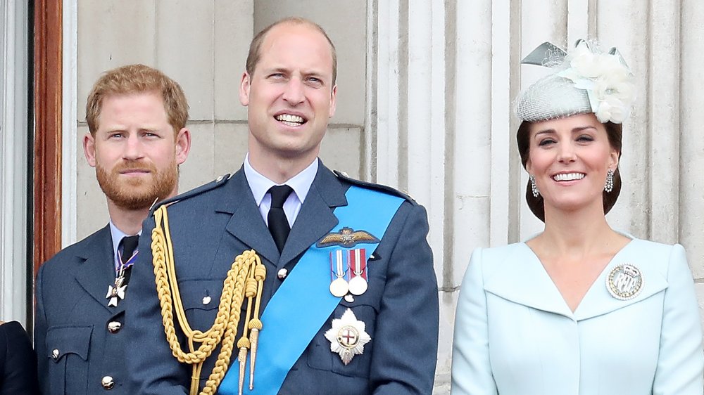 Prince Harry, Duke of Sussex, Prince William, Duke of Cambridge and Catherine, Duchess of Cambridge watch the RAF flypast on the balcony of Buckingham Palace