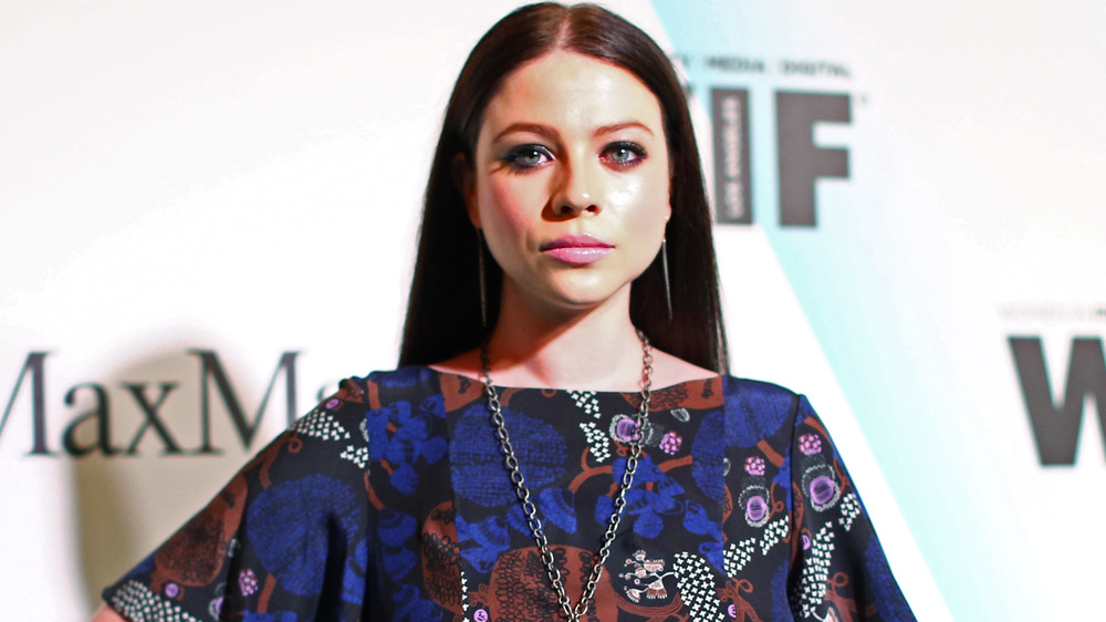 Michelle Trachtenberg looking at camera