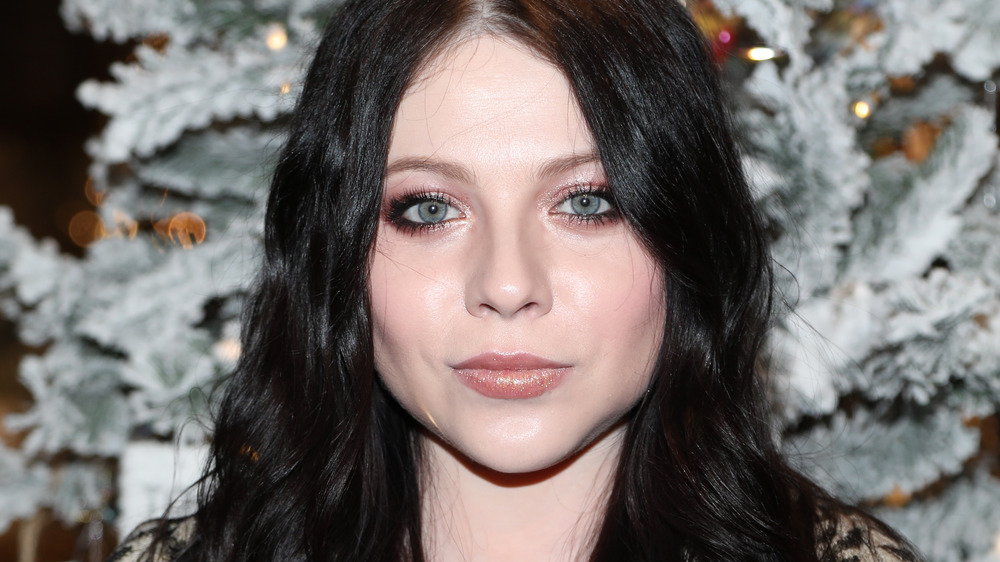 Michelle Trachtenberg looking at camera