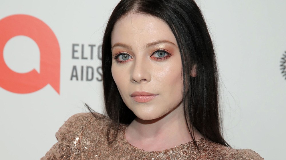 Michelle Trachtenberg looking at camera