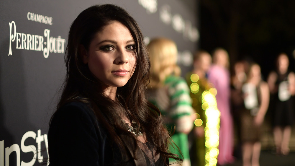 Michelle Trachtenberg smiling at camera