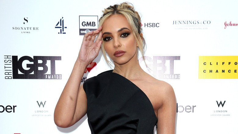 Jade Thirlwall posing hand to face
