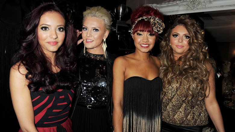 Little Mix smiling at an event