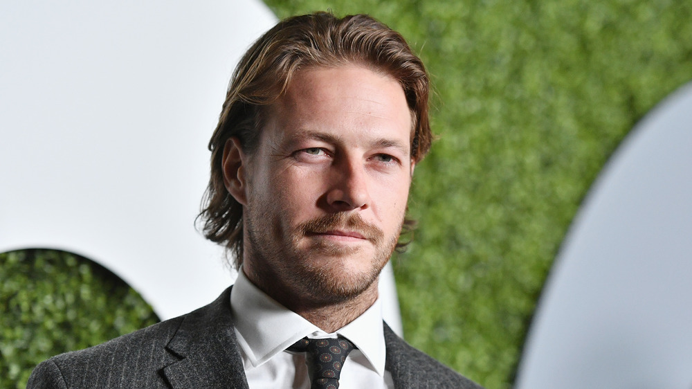 Luke Bracey at a GQ party