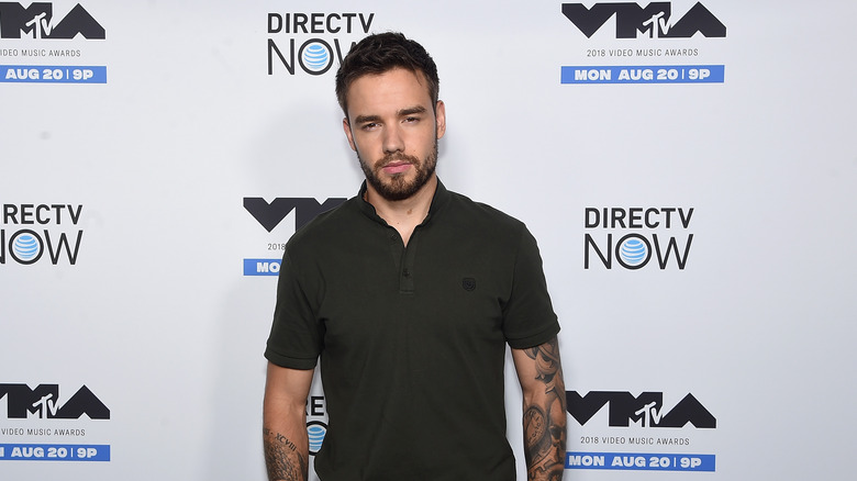 Liam Payne wearing black shirt