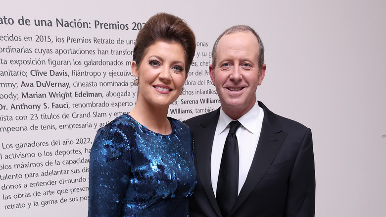 Norah O'Donnell and Geoff Tracy smiling