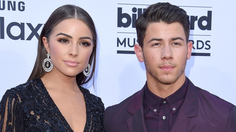 Olivia Culpo and Nick Jonas posing