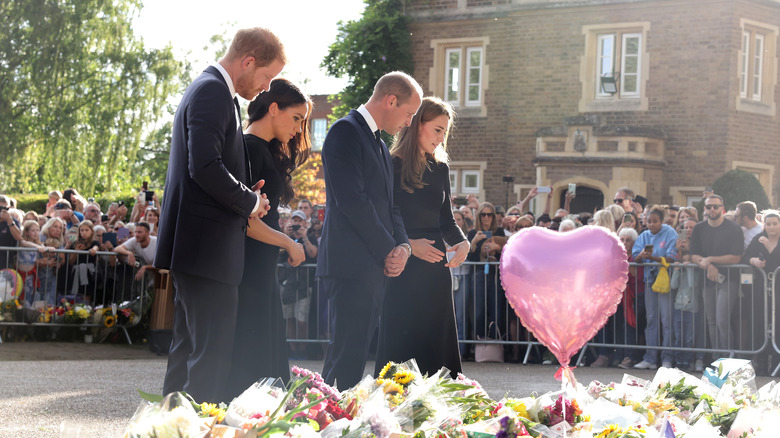 Kate, William, Harry, and Meghan walking