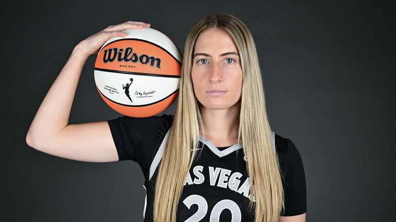 Kate Martin holds ball in WNBA portrait