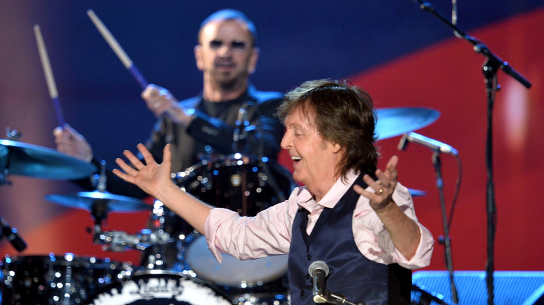 Paul McCartney and Ringo Starr performing