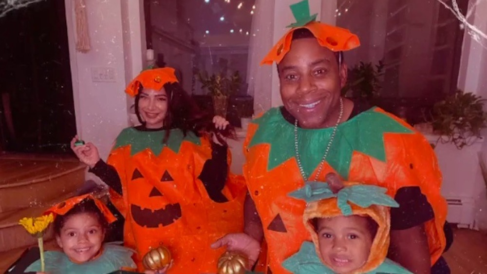 Kenan Thompson and family in matching pumpkin costumes