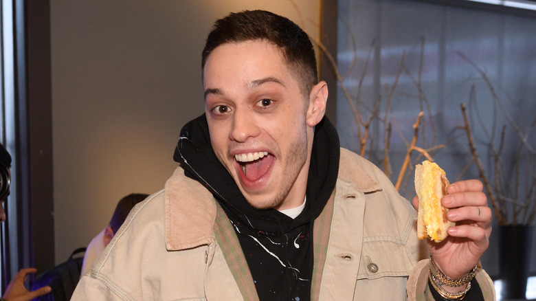 Pete Davidson smiling at an event