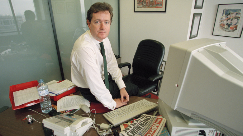 Piers Morgan at his desk