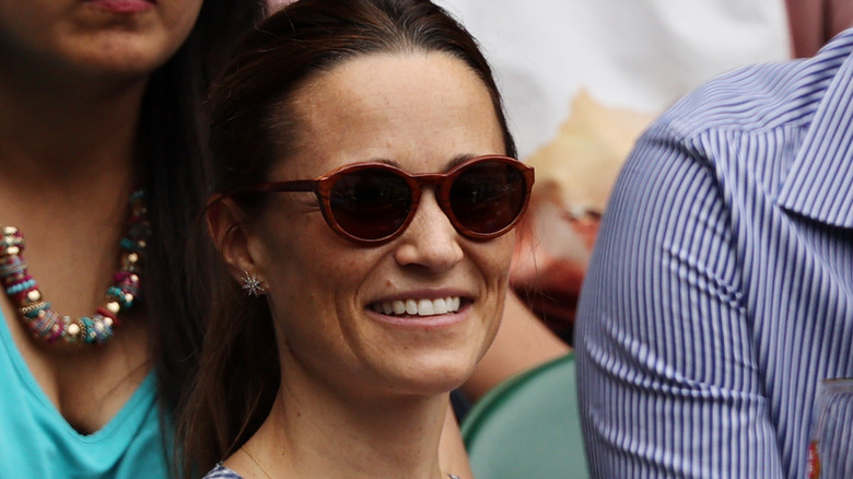 Pippa Middleton smiling and wearing sunglasses