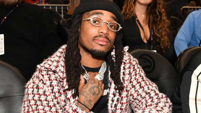 Quavo sitting at an NBA game