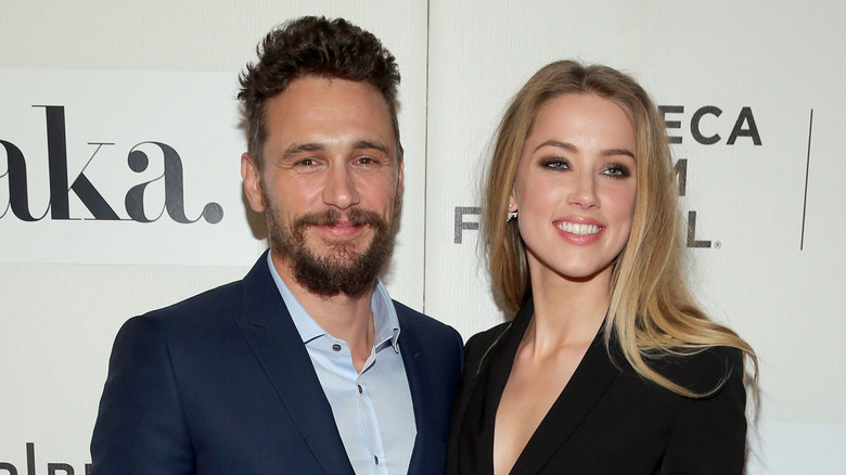 James Franco and Amber Heard smiling