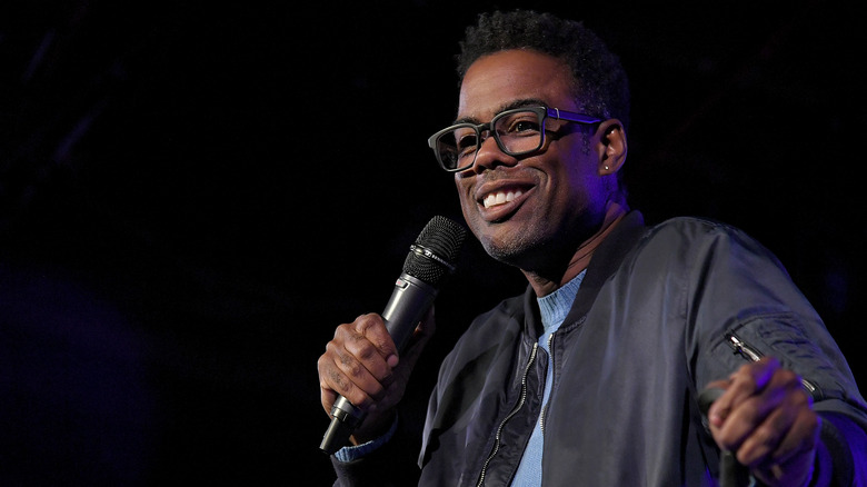 Chris Rock performs on stage