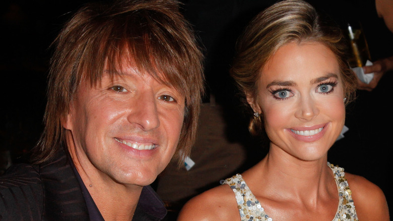 Richie Sambora posing with Denise Richards