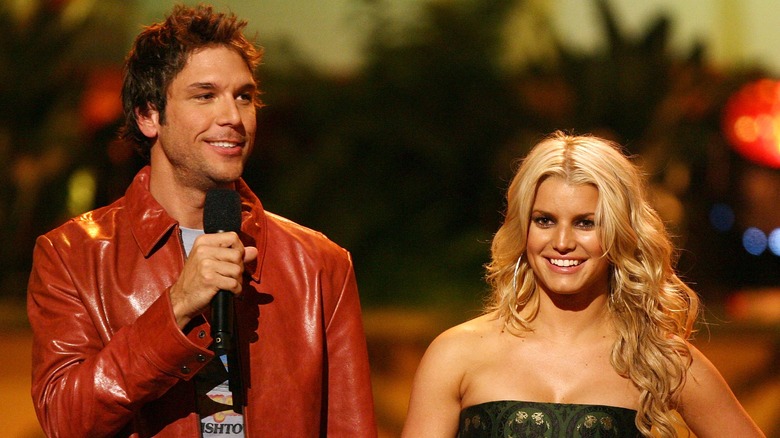 Dane Cook and Jessica Simpson at an event 