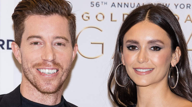 Shaun White and Nina Dobrev posing