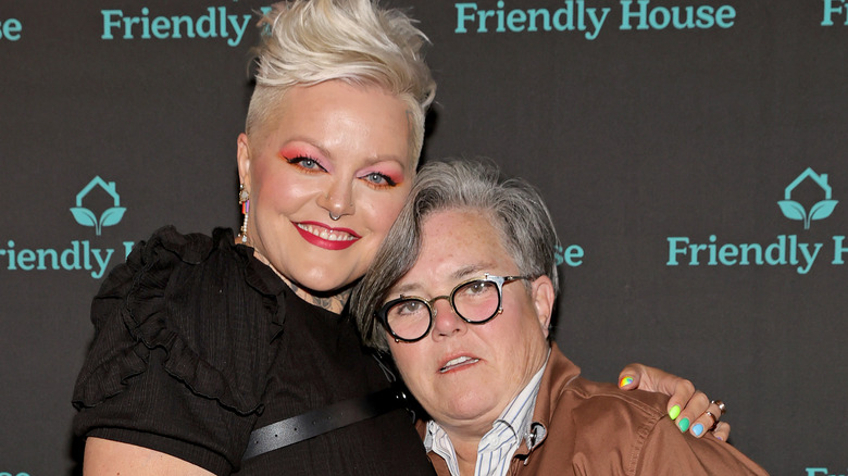 Aimee Hauer cuddling Rosie O'Donnell red carpet