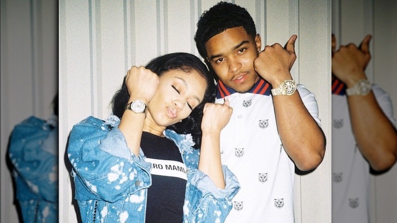 Saweetie and Justin Combs posing for a picture