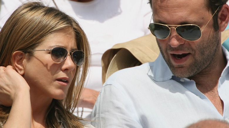 Aniston and Vaughn watching tennis