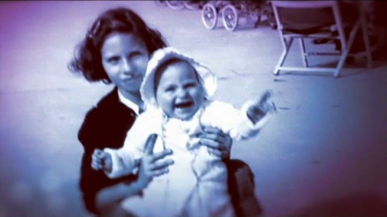 Barbra Streisand holding her baby sister