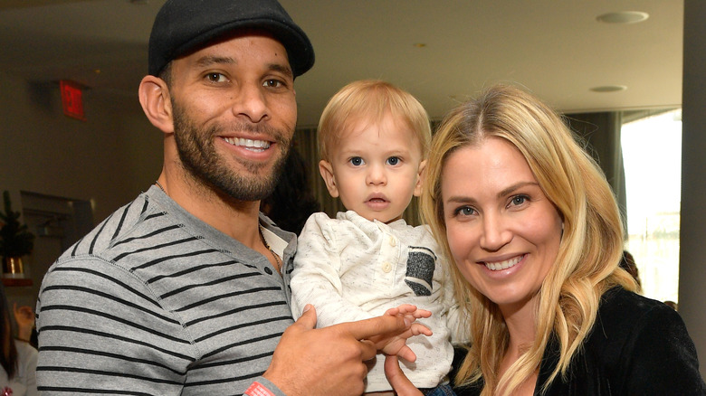 Willa Ford and Ryan Nece with son Elijah, posing