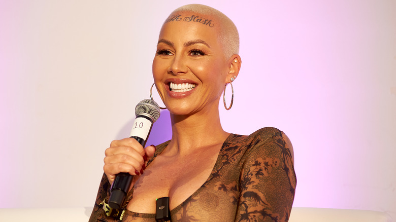 Amber Rose speaking into a mic