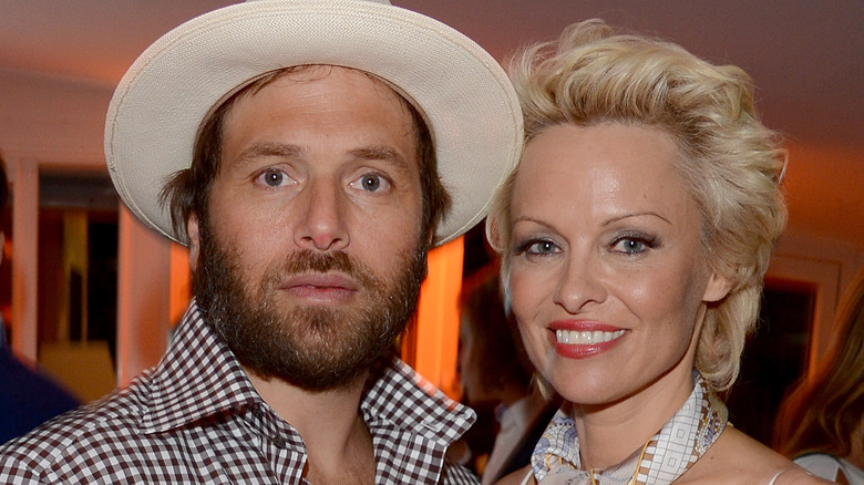 Rick Salomon and Pamela Anderson pose together