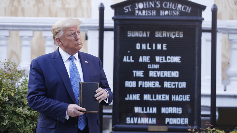 Donald Trump holds a Bible