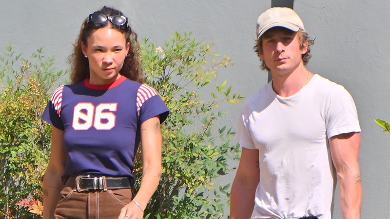 Ashley Moore and Jeremy Allen White walking