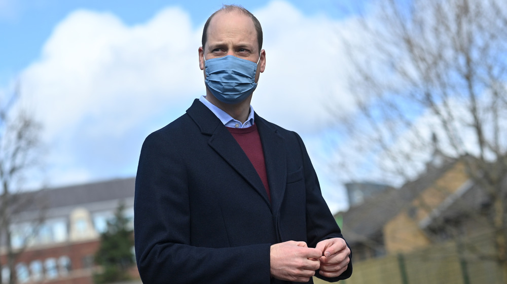 Prince William wearing a mask